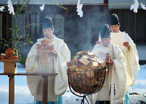 Japanese Shinto priests and sacred pyre