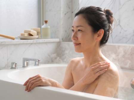 Japanese woman taking a bath at home